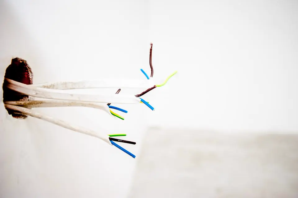 New cables coming out of a freshly chased wall